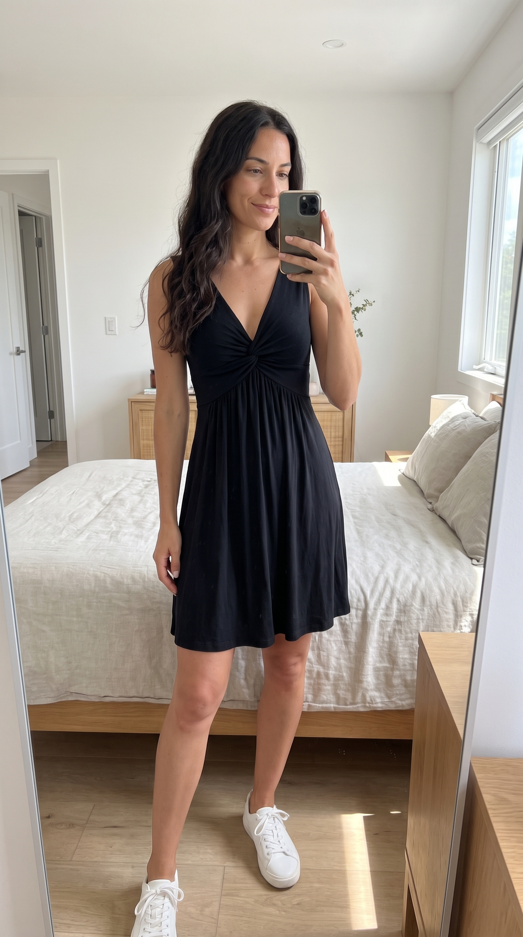 Twist-Front V-Neck Mini Dress in black with white sneakers, mirror view
