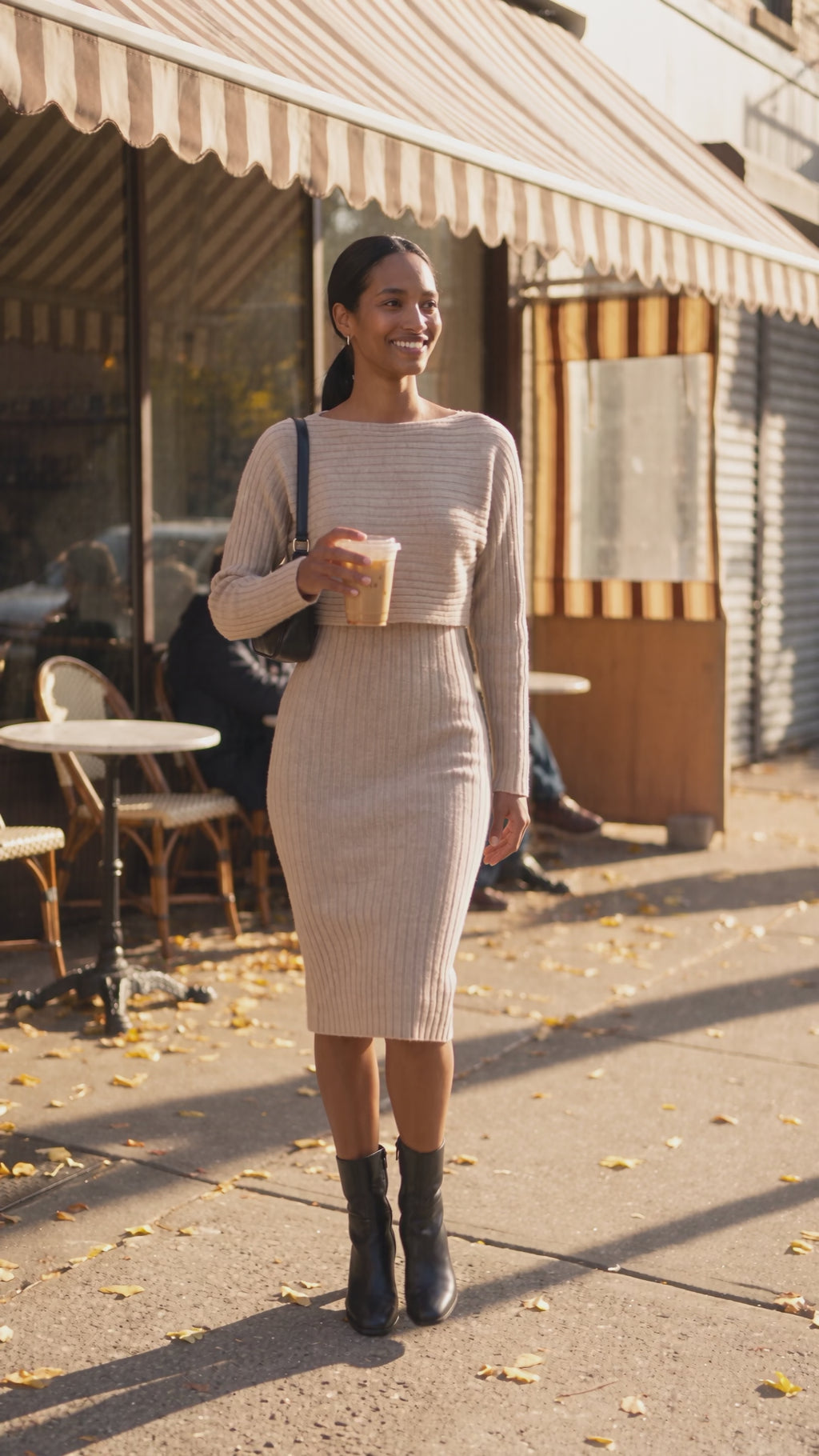 Video of the beige Ribbed Knit Set worn while walking outside a cafe