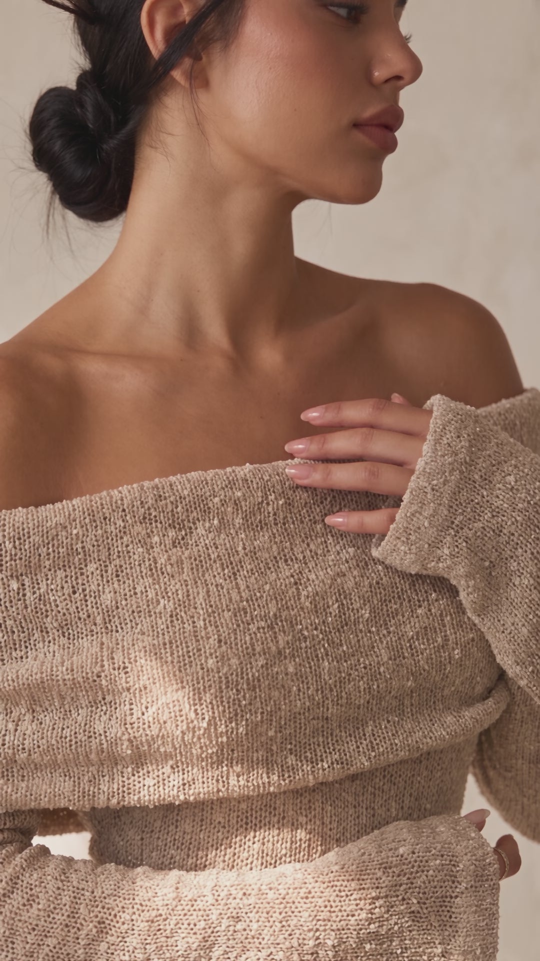 Close-up video of the fold-over collar and knit texture of the Off-Shoulder Knitted Maxi Dress